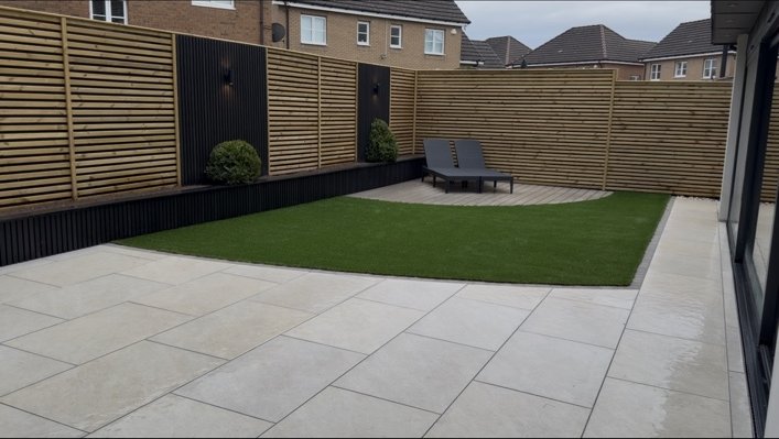 Stepps finished garden with paving, lawn and fencing