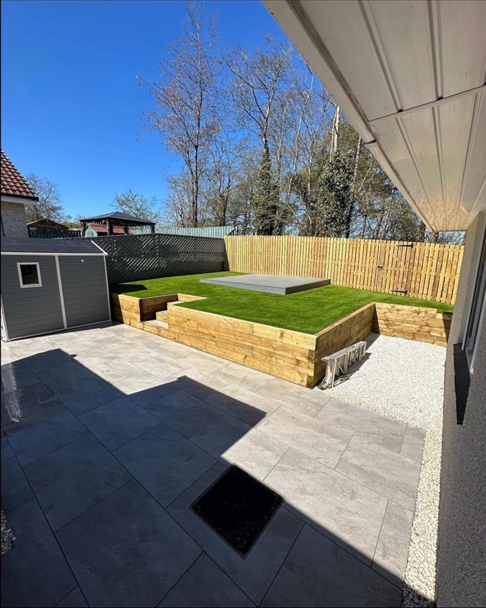 Stewarton finished garden with raised lawn, paving and fencing